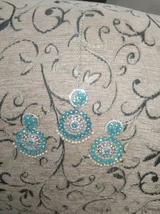 A beautiful earings and mangtika