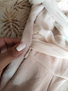 Light Pink Coloured One Piece With Bow Design At Back