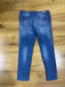 Distressed Denim Jeans