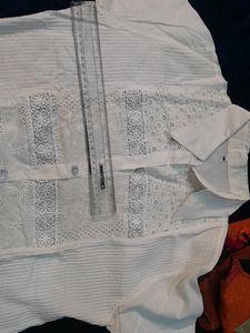 White Colored Shirt With Net Work On Front Sleeves