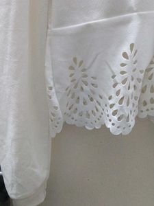 White Laser Cut Peplum Top