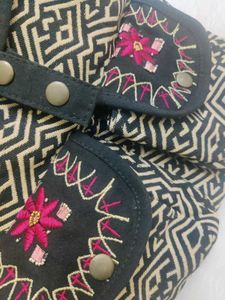 EMBROIDERED BACKPACK