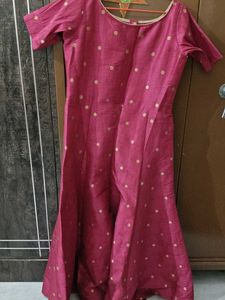 A Majenta Ethnic Gown...