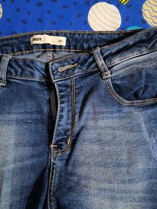 Distressed Denim Jeans