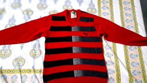 Branded red color sweater for men.