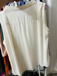 Sleeveless Button-Up Blouse