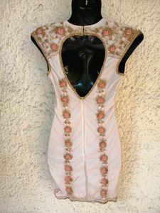 Beaded cut out sleeveless mini dress