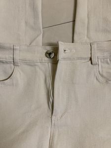 Ripped Knee Beige Pants