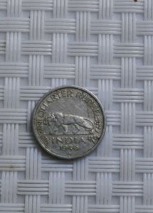A 1946 British India quarter rupee coin
