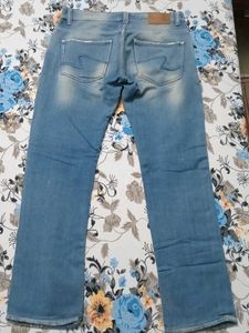 Ripped Jeans - Light Wash Denim