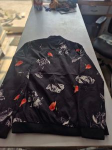 Black colour flora printed varsity jacket for both