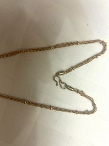 Elegant Gold and Black Necklace