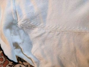 White Knit Sweater Detail