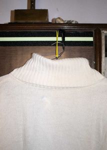 2 White turtle neck sweater