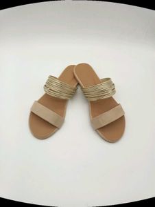 Tan And Gold Flat Sandals.