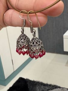 Silver Jhumka Earrings with Red Beads