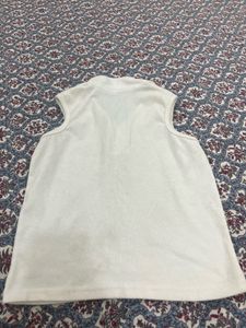 White Sleeveless Top