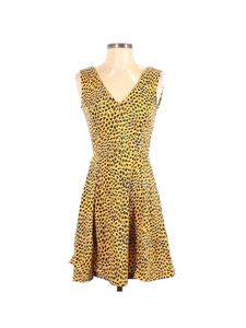 H&M yellow and Black animal print skater dress.