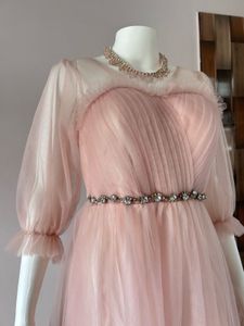 Pink stone studded tulle gown