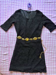 Embroidered black dress