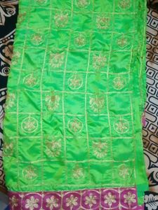 Green Saree with Pink Lace Border
