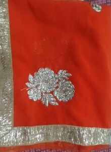 Orange Saree with Silver Embroidery
