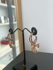 Pearl &amp; Rose Gold Bow Drop Earrings