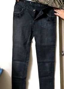 Stylish Dark Wash Jeans with Subtle Embroidery