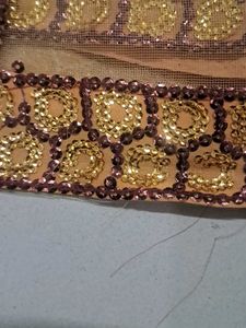 Elegant Peach Saree with Gold Embellishments