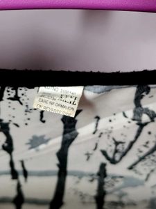 Patterned top with crystals