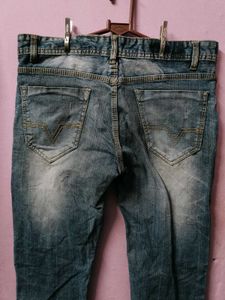 Distressed Blue Denim Jeans
