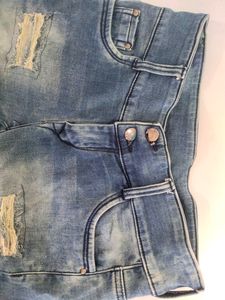Women Ripped Faded Blue Jeans