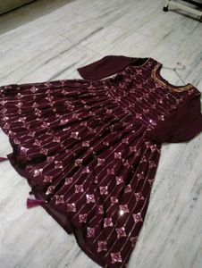 A Beautiful Women Festive Wear Wine Sharara