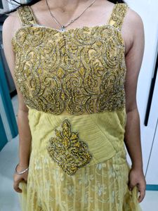 Golden Heavy Work Gown For Women.