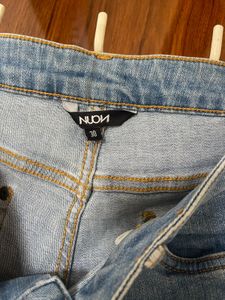 Ripped Knee Light Wash Jeans