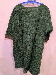 Green floral print kurti with golden detailing