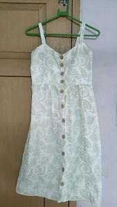 White and green printed dress
