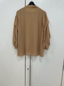 ✨ Architectural Chic: The Taupe Drape Blouse! 🧵