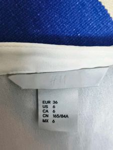 H&amp;M. White Wrap Top