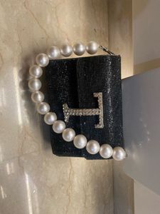 Embellished Mini Black Clutch with Pearl Handle