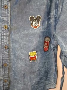 Denim shirt with patches