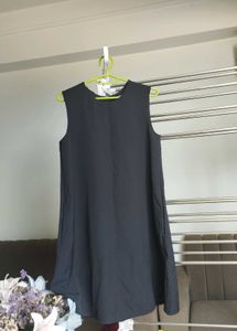 black Short sleeveless dress.