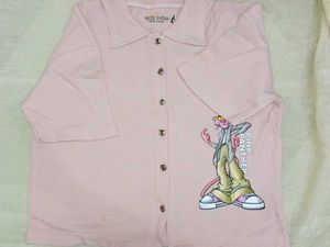 A beautiful peach coloured crop shirt