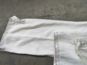 A White Short Kurti With Straight Pent