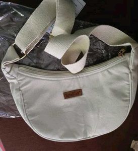 Cream-colored Slingbags