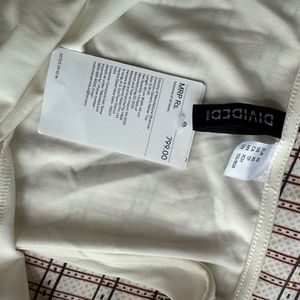 White Sleeveless Top