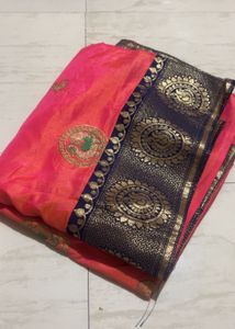 Coral Pink–Orange Silk Saree with Navy Blue Border