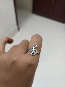 a silver coated music ring.