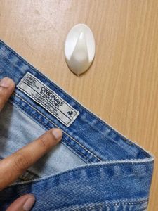 Distressed Denim Jeans