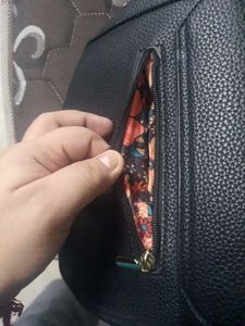black sling bag